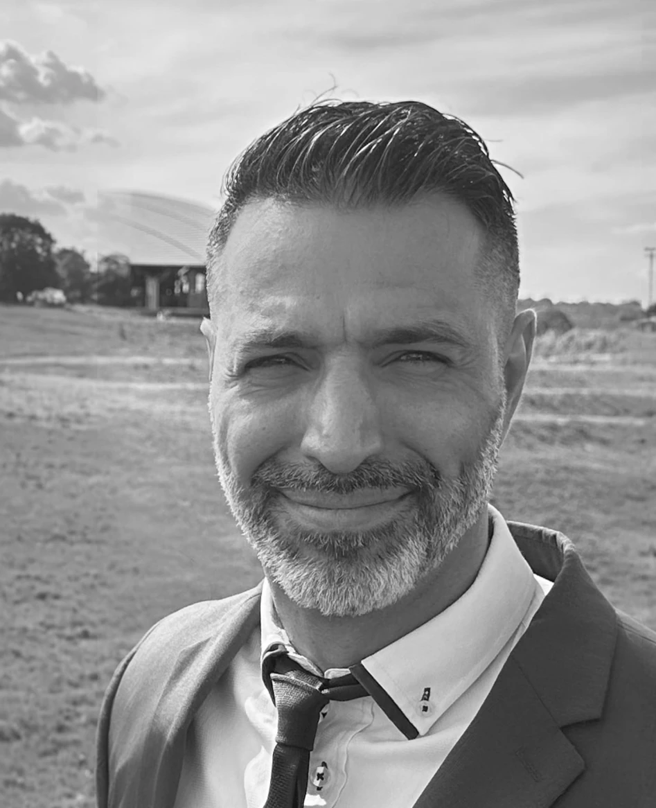 greyscale photo of Walid Nozhat