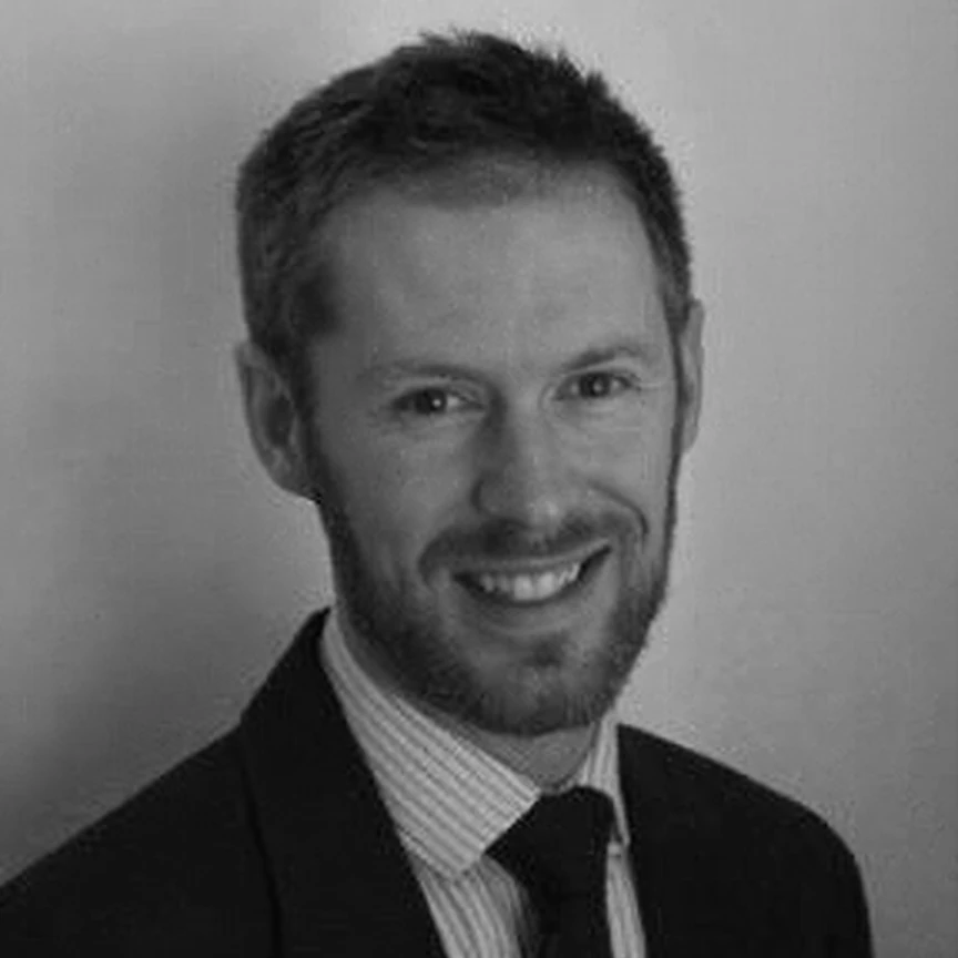 greyscale photo of Daniel Brogan