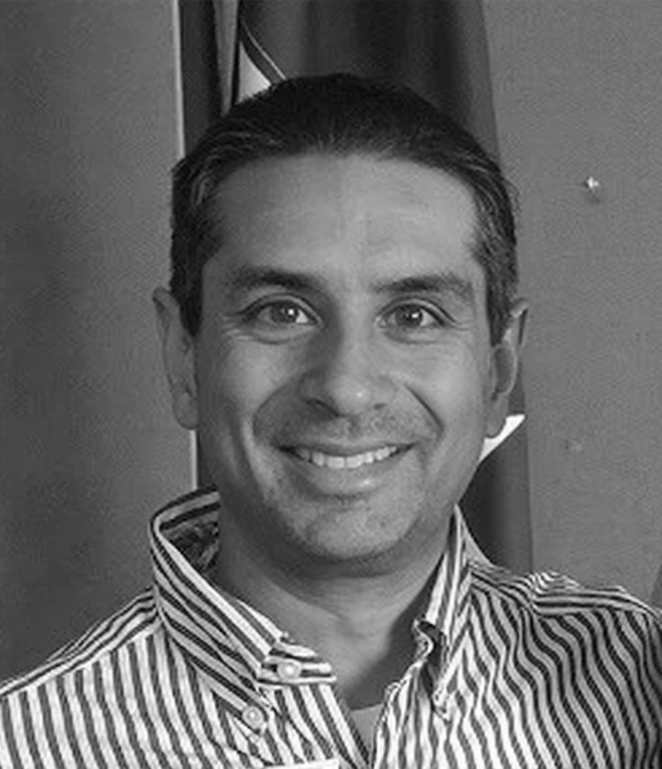 greyscale photo of Satpal Seehra