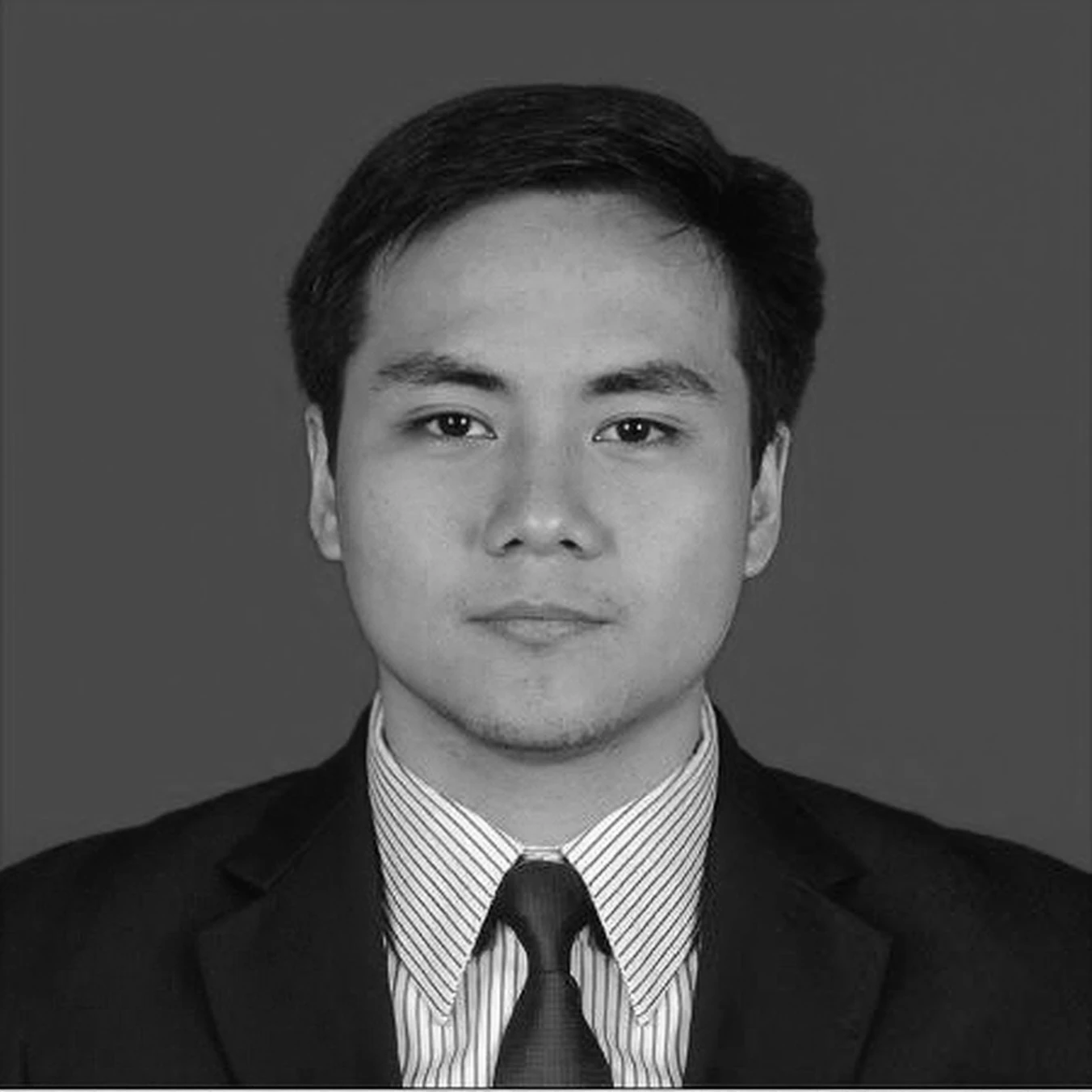 greyscale photo of Justin Barias